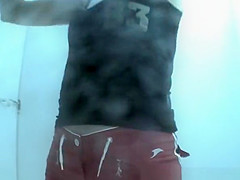 Red shorts girl in beach cabin
