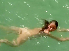 Incredible naked girl takes a swim