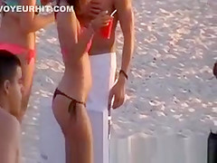 A Hot Chick in a Thong on the Beach
