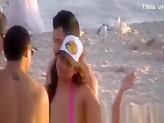 A Hot Chick in a Thong on the Beach