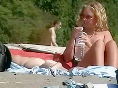 Voyeur zooms on milf's pussy