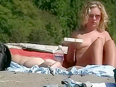 Voyeur zooms on milf's pussy