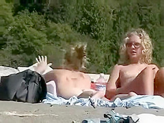 Voyeur zooms on milf's pussy