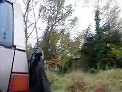 German MILF sucks cock in a car with voyeurs