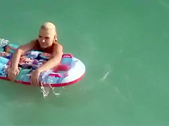 Big topless natural breasts on beach