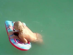 Big topless natural breasts on beach
