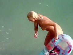 Big topless natural breasts on beach