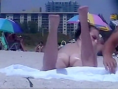 Wet and oiled ass gets voyeured