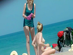 Two sisters spied on a nudist beach
