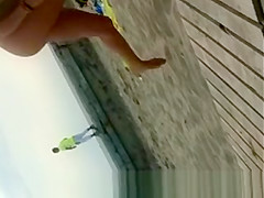 Sexy blonde chick in yellow bikini