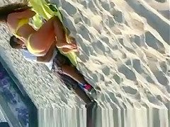 Sexy blonde chick in yellow bikini