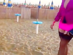 On the beach with excellent sexy Woman in FF stockings.