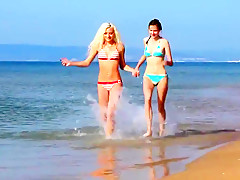Gorgeous blonde models emmi and marena playing at the beach
