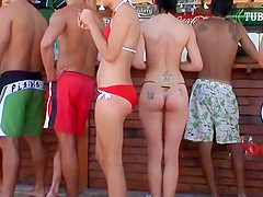 Tattooed ass followed on a beach party