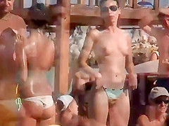 Tattooed ass followed on a beach party