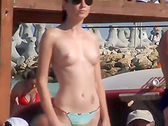 Tattooed ass followed on a beach party