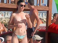 Tattooed ass followed on a beach party