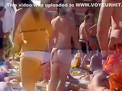 Tattooed ass followed on a beach party