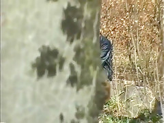Outdoor Girl Gives Blow Job In The Forest