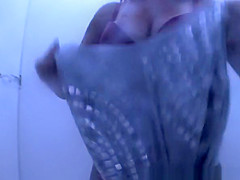 Busty chick caught in beach cabin