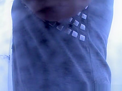 Busty chick caught in beach cabin