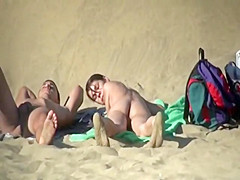 Couple getting horny on a beach