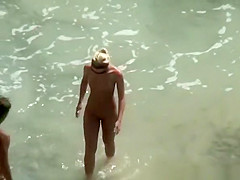 Nude couple secretly filmed in the rocky beach