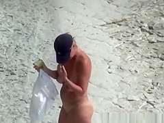 Big tits nudist woman with shaved pussy