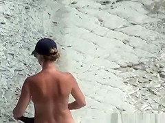 Big tits nudist woman with shaved pussy