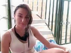 tattooed exhibitionist masturbating on her balcony