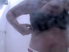 Chubby woman with big tits and hairy pussy spied