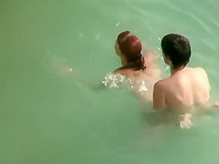 They struggle to fuck in the water