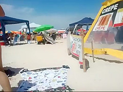 Peeping a big butt in a thong bikini