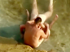 Guy gets an amazing blowjob in the shallow water
