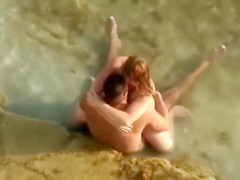 Guy gets an amazing blowjob in the shallow water
