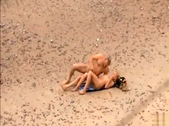Old daddy tempts the young blonde on a beach