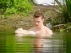 Short-haired GF jumps on a dick while swimming in the lake