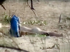 Drunk girl sunbathes completely naked