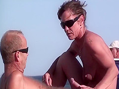 Voyeur catches a hot French wife tugging on a stiff cock