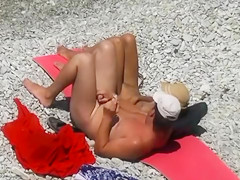 Nude beach relaxation and gentle penis stroking