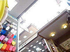 Ultra hot woman buying mobile