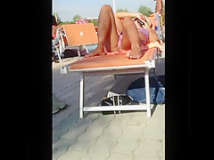 Milf in bikini at swimming pool
