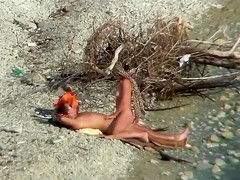 Lazy guy cums into a girlfriend's pussy on the nudist beach