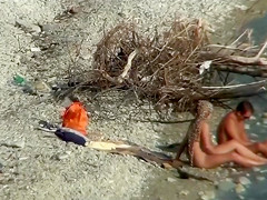 Lazy guy cums into a girlfriend's pussy on the nudist beach