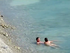 Sensual girl jumps on her boyfriend's fat dick at the nude beach