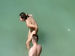 Adorable woman has steaming hot sex in the water