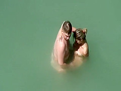 Adorable woman has steaming hot sex in the water