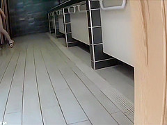 Older people walk around the beach completely naked