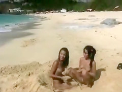 Nude beach foreplay and lesbian licking with brunettes