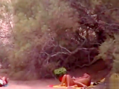 Hubby playing with her pussy in beach voyeur view